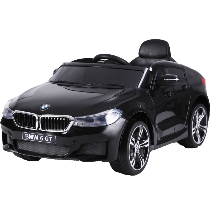 Trẻ em đi xe điện bằng xe Bmw có điều khiển từ xa